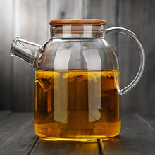 Load image into Gallery viewer, Glass Teapot, large capacity:  1000 ml or 1800 ml,  heat-resistant, filter flower, bamboo cover